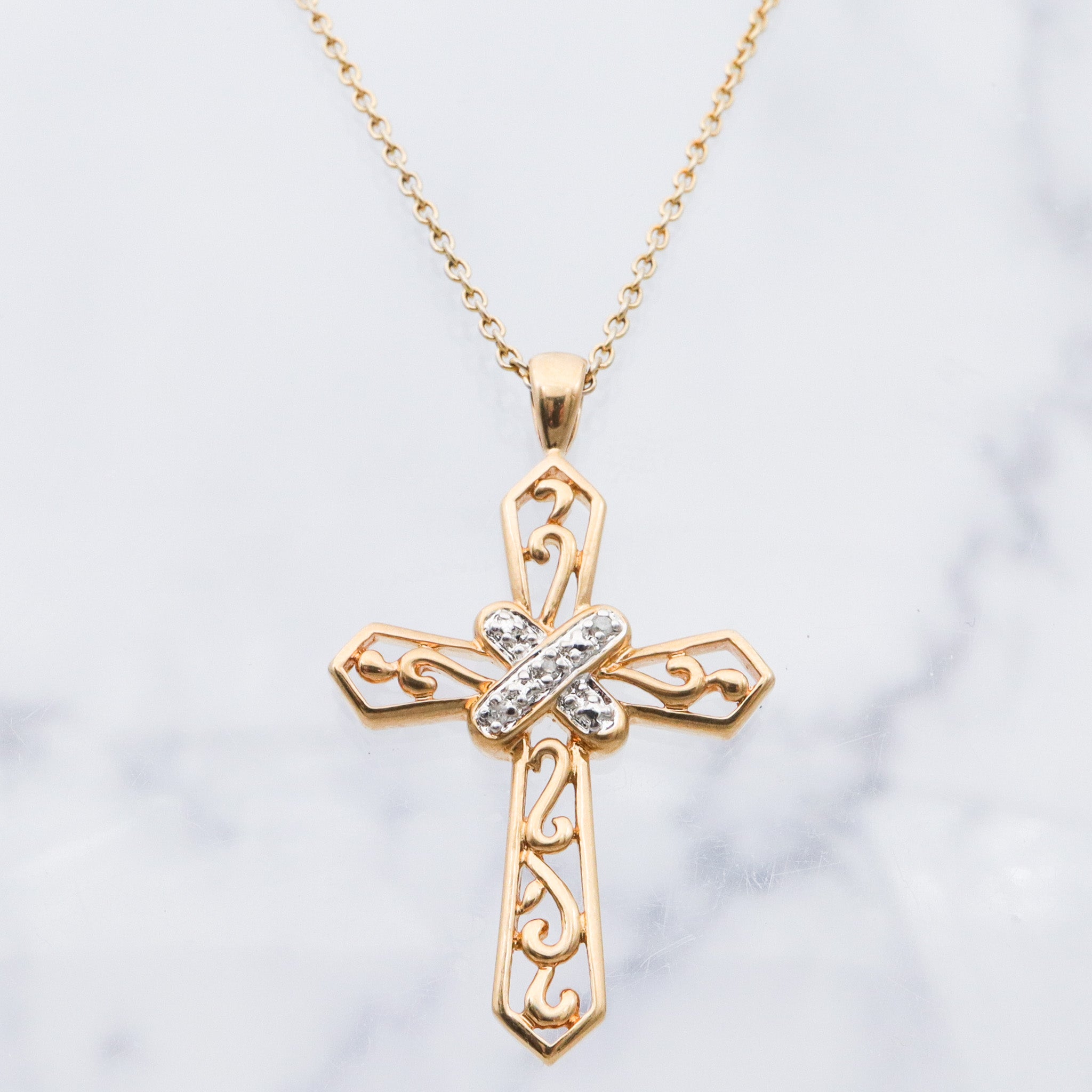 Vintage gold plated sterling silver filigree cross pendant with diamond accents